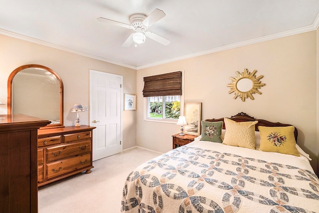 bedroom featuring ceiling fan, light colored carpet, and ornamental molding