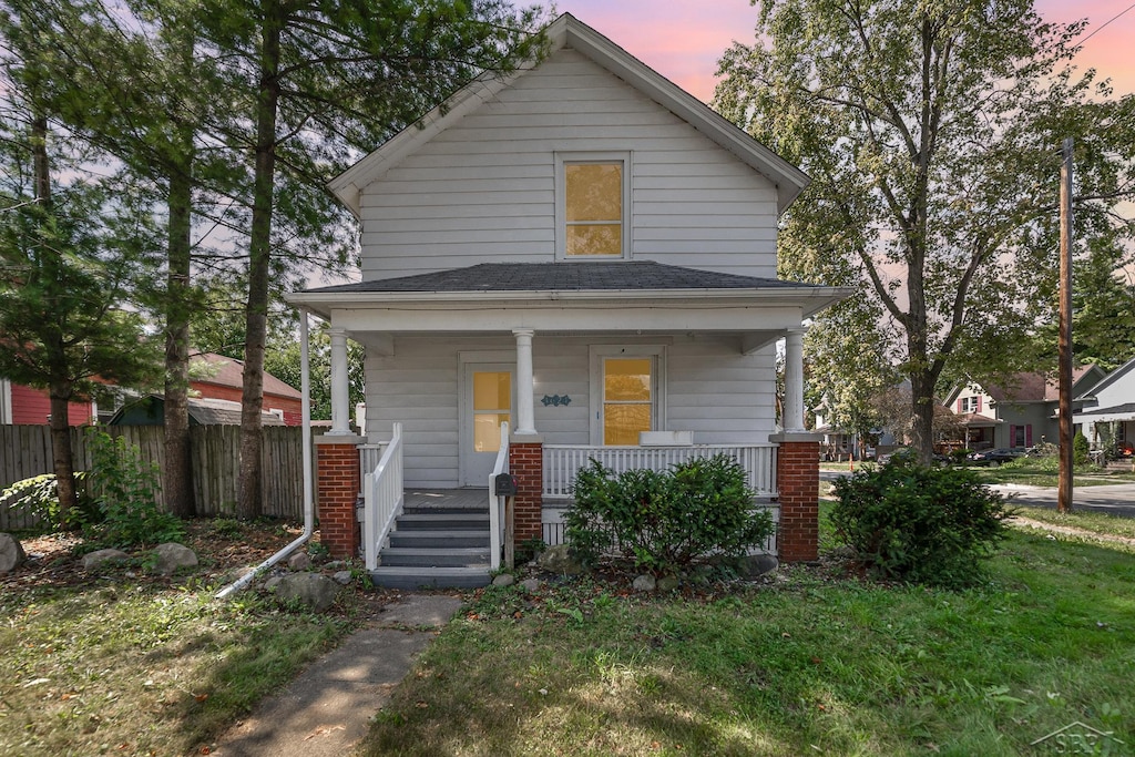 bungalow-style home with covered porch