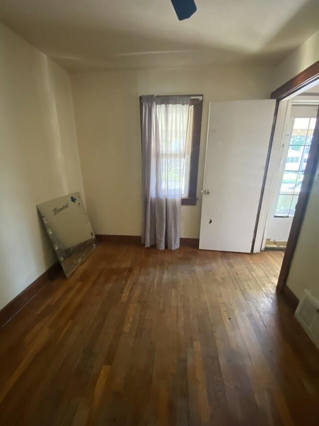 836 Victoria Ave, Flint, MI 48507 - unfurnished room featuring hardwood / wood-style floors and ceiling fan