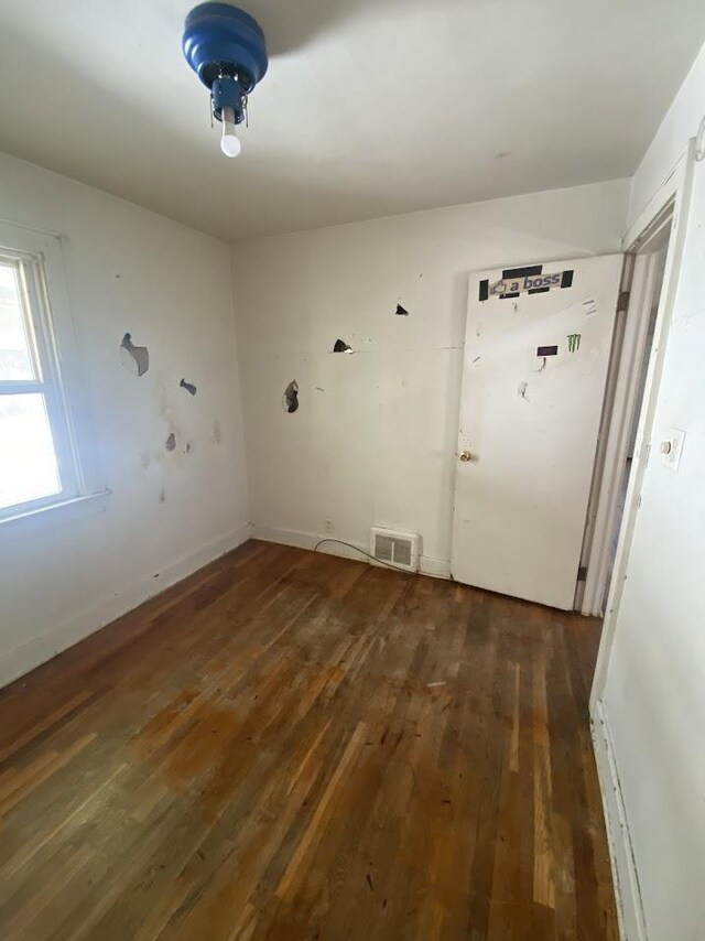 836 Victoria Ave, Flint, MI 48507 - unfurnished room with hardwood / wood-style floors and baseboards