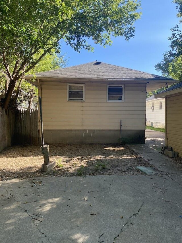 836 Victoria Ave, Flint, MI 48507 - view of home's exterior with a patio area