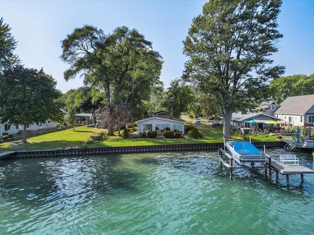 dock area featuring a water view