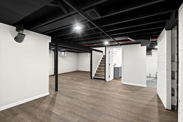 basement with wood-type flooring