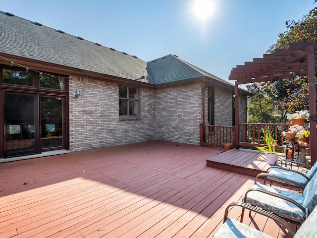 wooden deck with a pergola