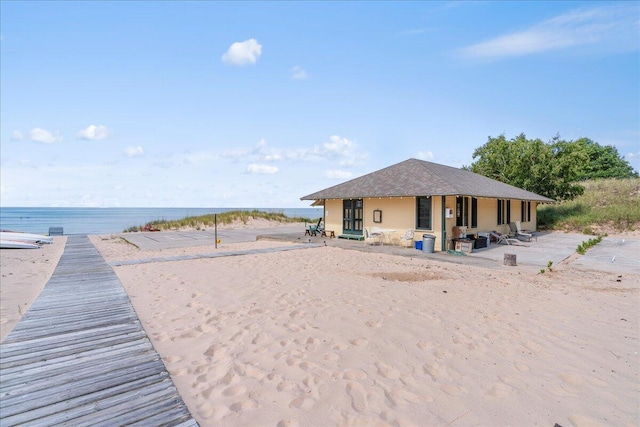 876 S Beach, Pentwater, MI 49449 - back of house with a water view