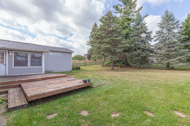 view of yard featuring a deck