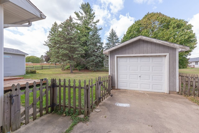 garage with a yard