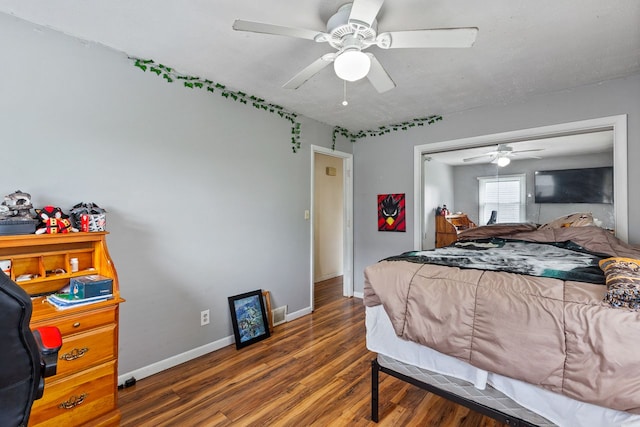 bedroom featuring a closet, ceiling fan, and dark wood-type flooring