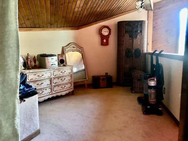 carpeted bedroom featuring crown molding and wood ceiling