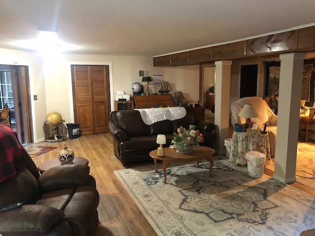 living room with light hardwood / wood-style floors