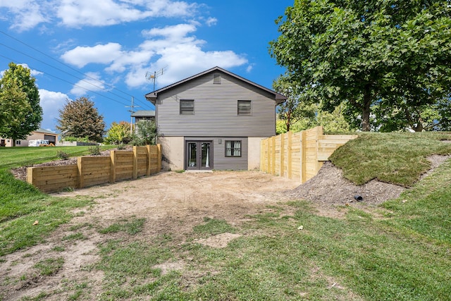 back of property featuring french doors