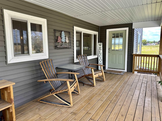 wooden deck with a porch