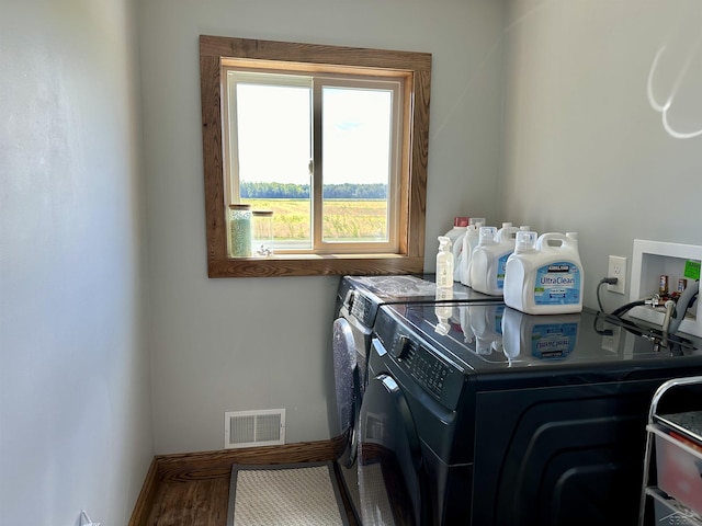 laundry area featuring separate washer and dryer