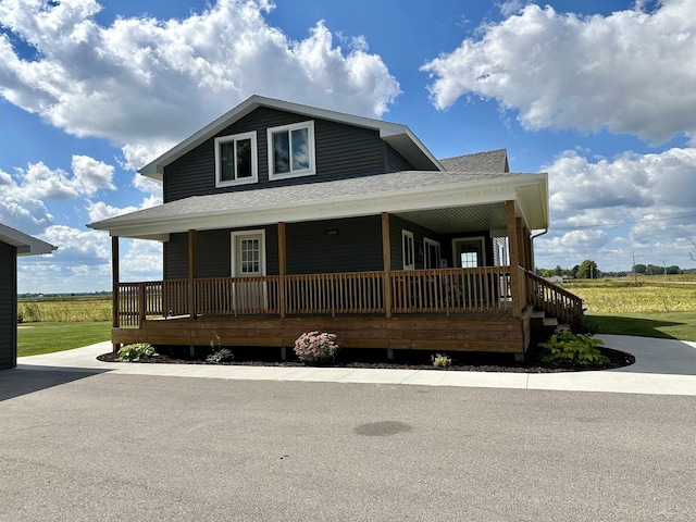 country-style home with covered porch