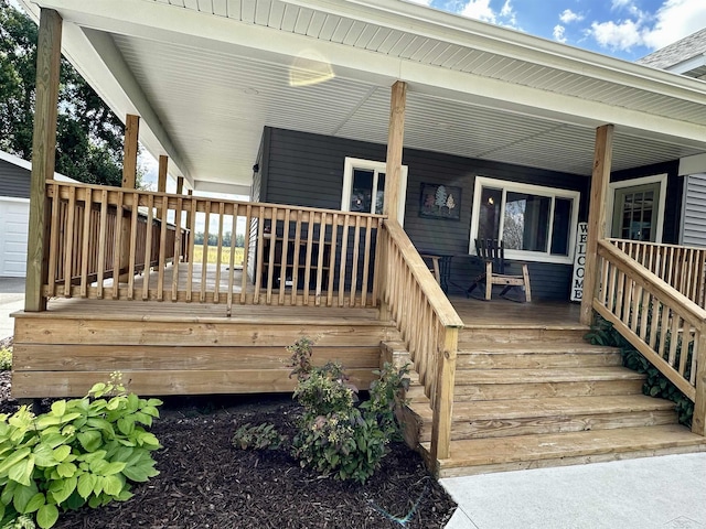 wooden terrace with a porch