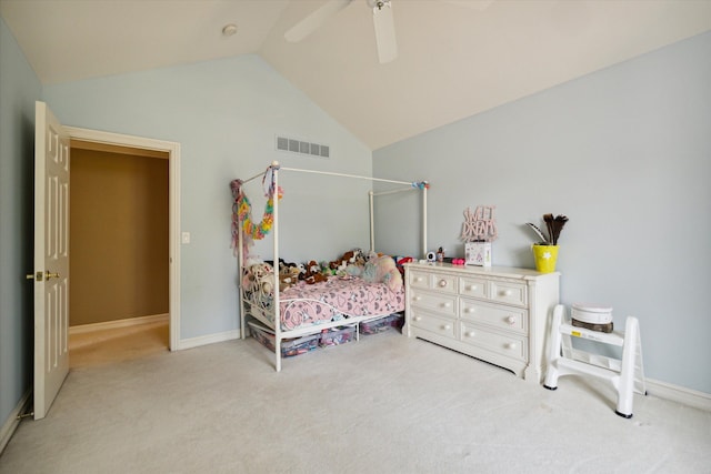 bedroom featuring light carpet, vaulted ceiling, and ceiling fan