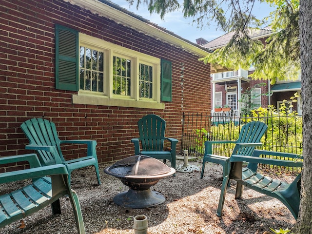 view of patio featuring an outdoor fire pit