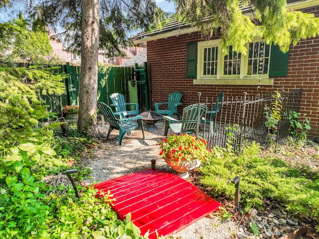 view of patio featuring an outdoor fire pit