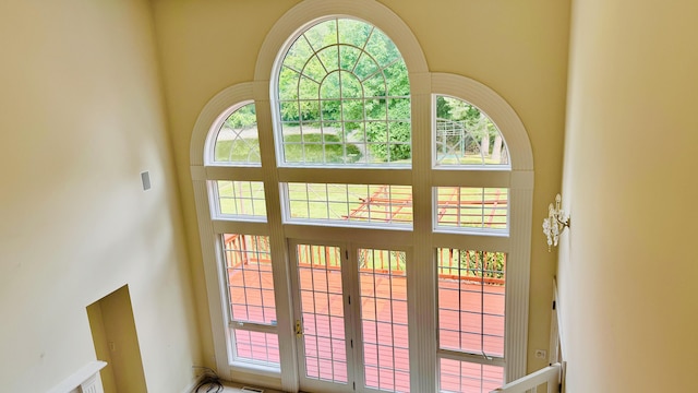 entryway featuring a high ceiling