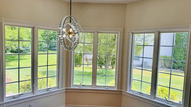 unfurnished sunroom with a wealth of natural light