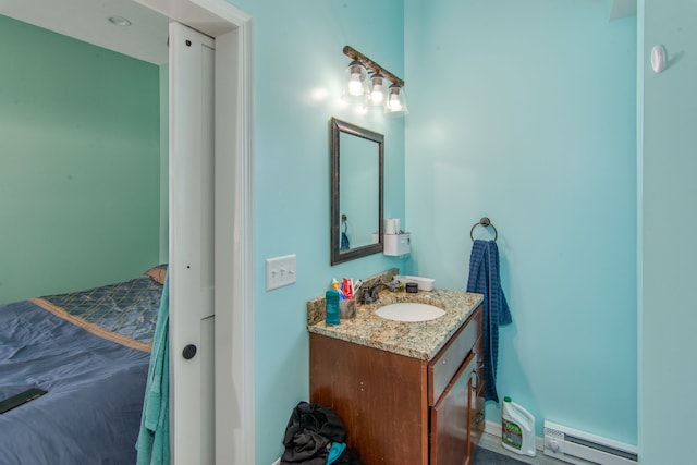 bathroom featuring vanity and a baseboard radiator