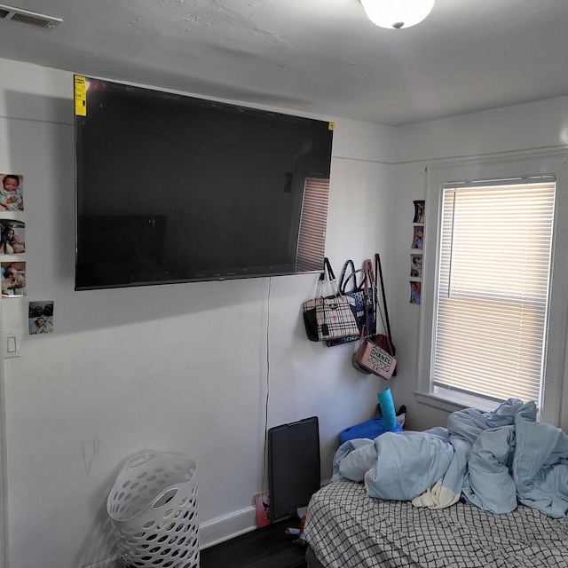 bedroom featuring hardwood / wood-style floors