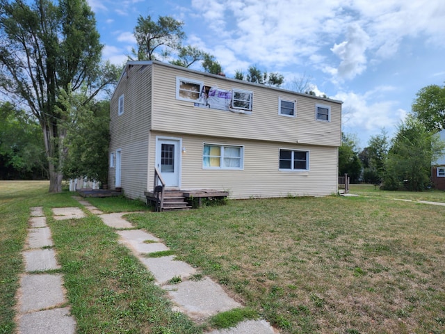 view of front of property with a front lawn