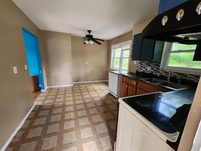 kitchen featuring exhaust hood, sink, ceiling fan, tasteful backsplash, and white electric range oven