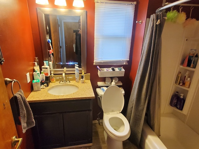 full bathroom with tile patterned flooring, shower / tub combo, vanity, and toilet