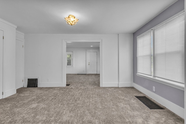 interior space featuring light colored carpet