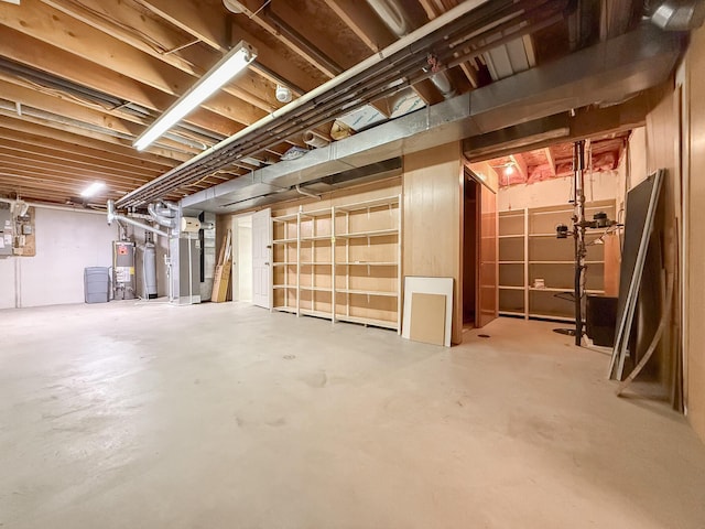 basement with heating unit and water heater