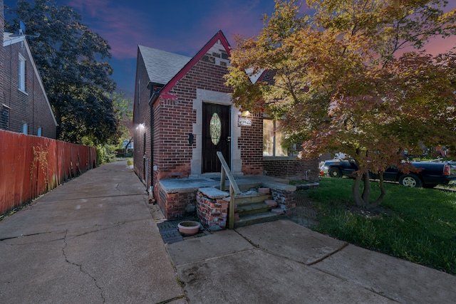 view of front of home with a lawn