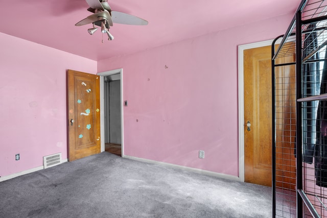 unfurnished bedroom with carpet and ceiling fan