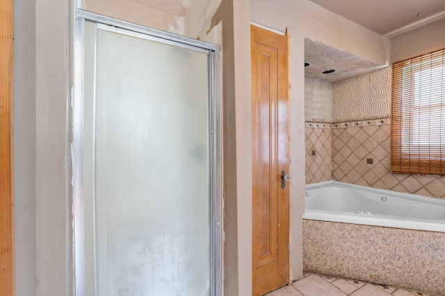 bathroom with tile patterned flooring and plus walk in shower