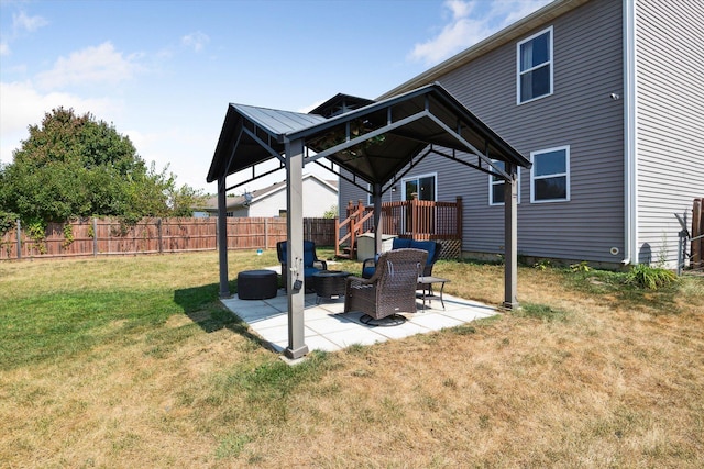 view of yard featuring a patio area, a gazebo, and an outdoor hangout area