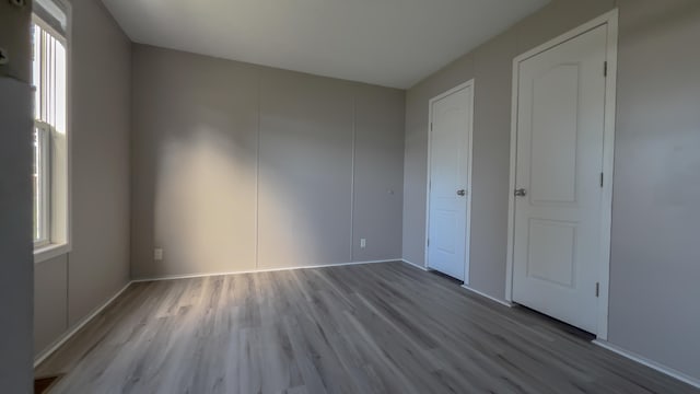 interior space featuring light hardwood / wood-style floors and plenty of natural light