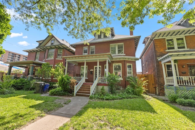 3937 Avery St, Detroit, MI 48208 - view of front of property with covered porch, a front lawn, and brick siding