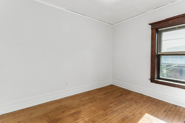 3937 Avery St, Detroit, MI 48208 - unfurnished room with baseboards, ornamental molding, and hardwood / wood-style floors
