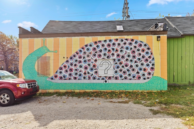 3937 Avery St, Detroit, MI 48208 - view of home's exterior with concrete block siding and a shingled roof