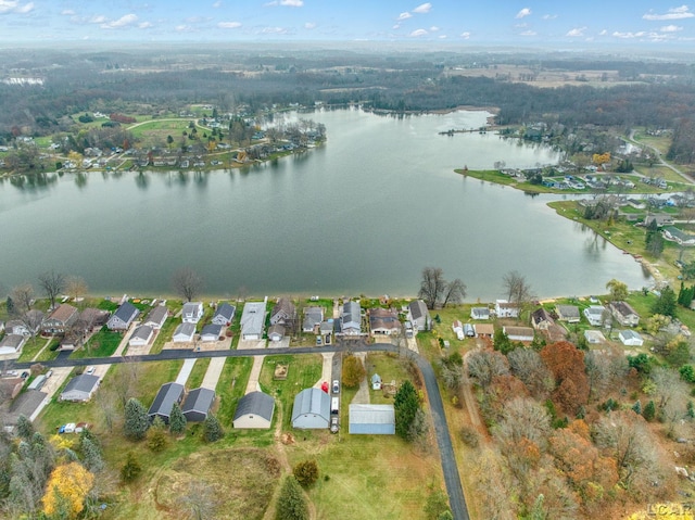 drone / aerial view with a water view