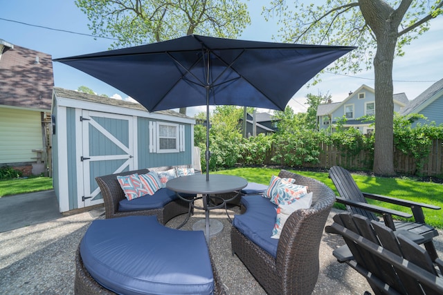 view of patio with a storage unit