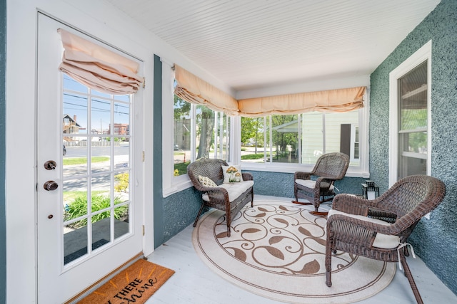 sunroom featuring a wealth of natural light