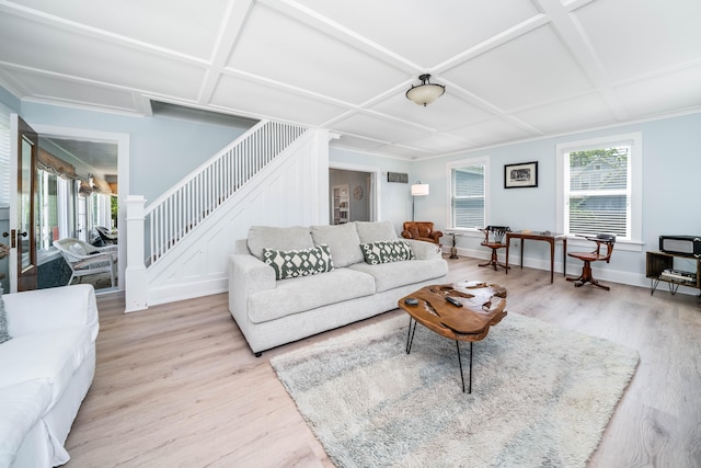 living room featuring light hardwood / wood-style flooring and coffered ceiling