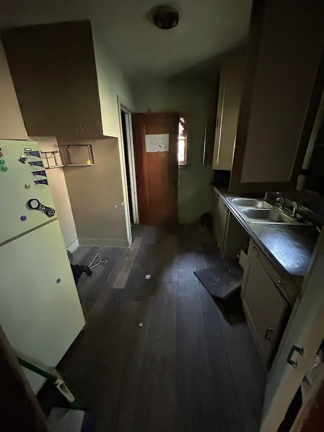 kitchen featuring dark hardwood / wood-style floors and sink