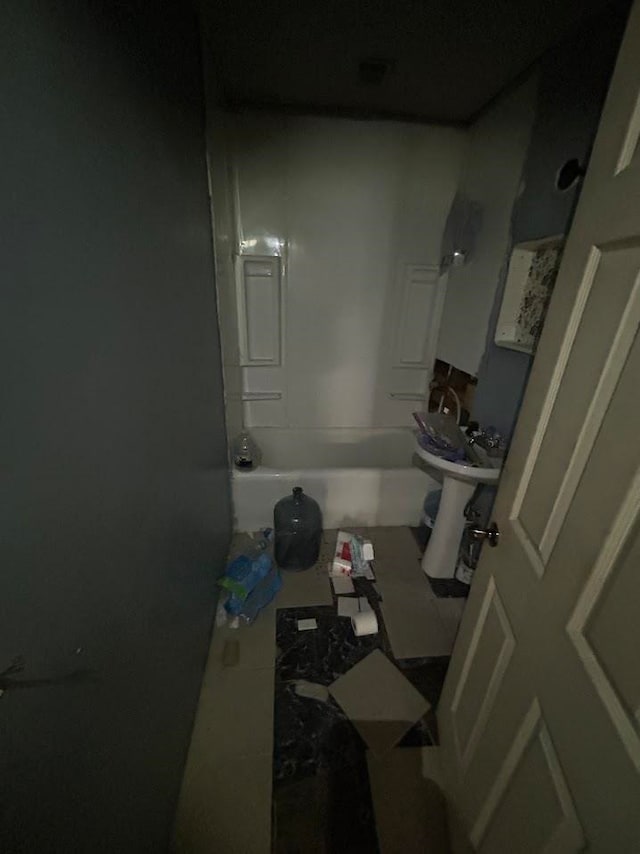 bathroom featuring shower / tub combination and tile patterned flooring