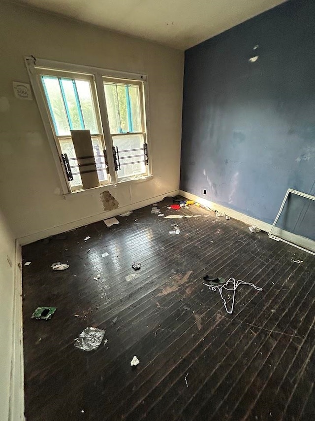 empty room featuring hardwood / wood-style floors