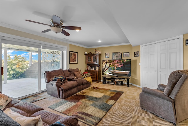 living room featuring light colored carpet, ceiling fan, and ornamental molding