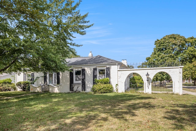 view of front of home with a front yard