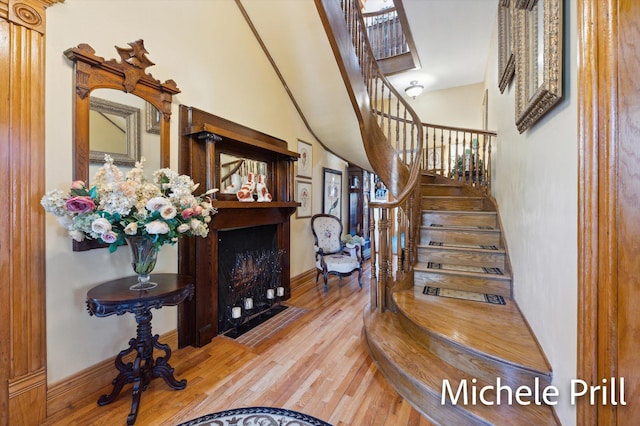 staircase featuring hardwood / wood-style floors