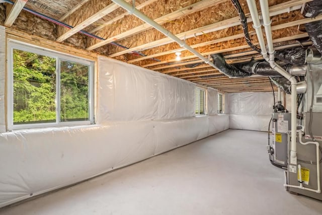 basement featuring water heater